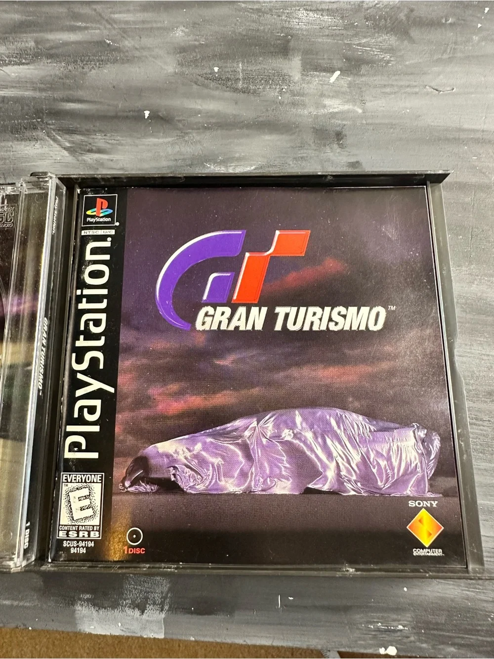 PlayStation Grand Turismo game with case and booklets